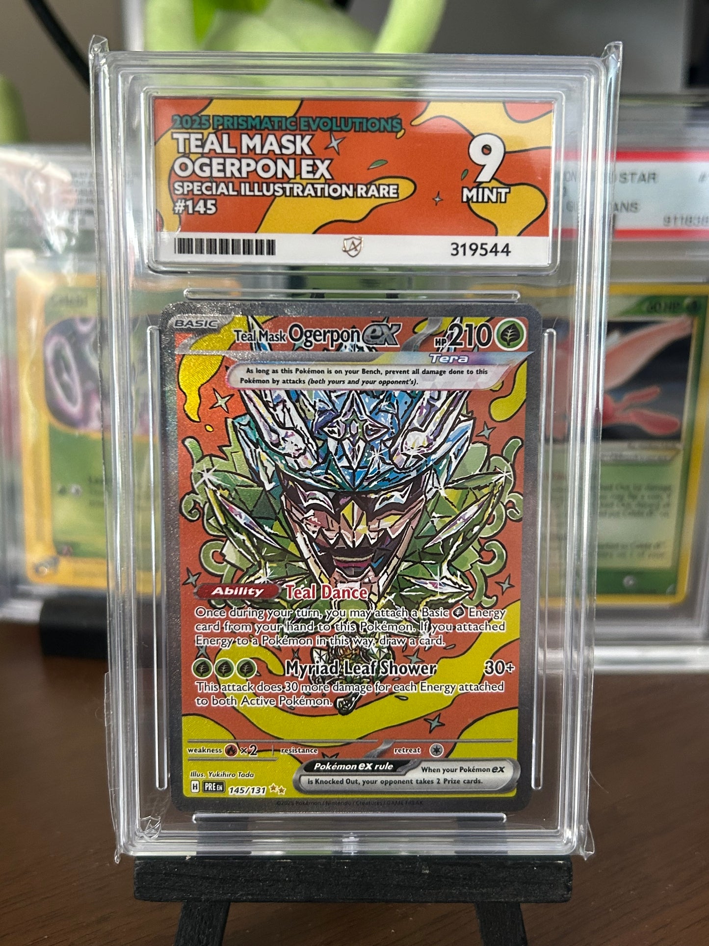 Teal Mask Ogerpon EX SIR - Prismatic Evolutions - 145/131 - Ace Grading Mint 9 Graded Card