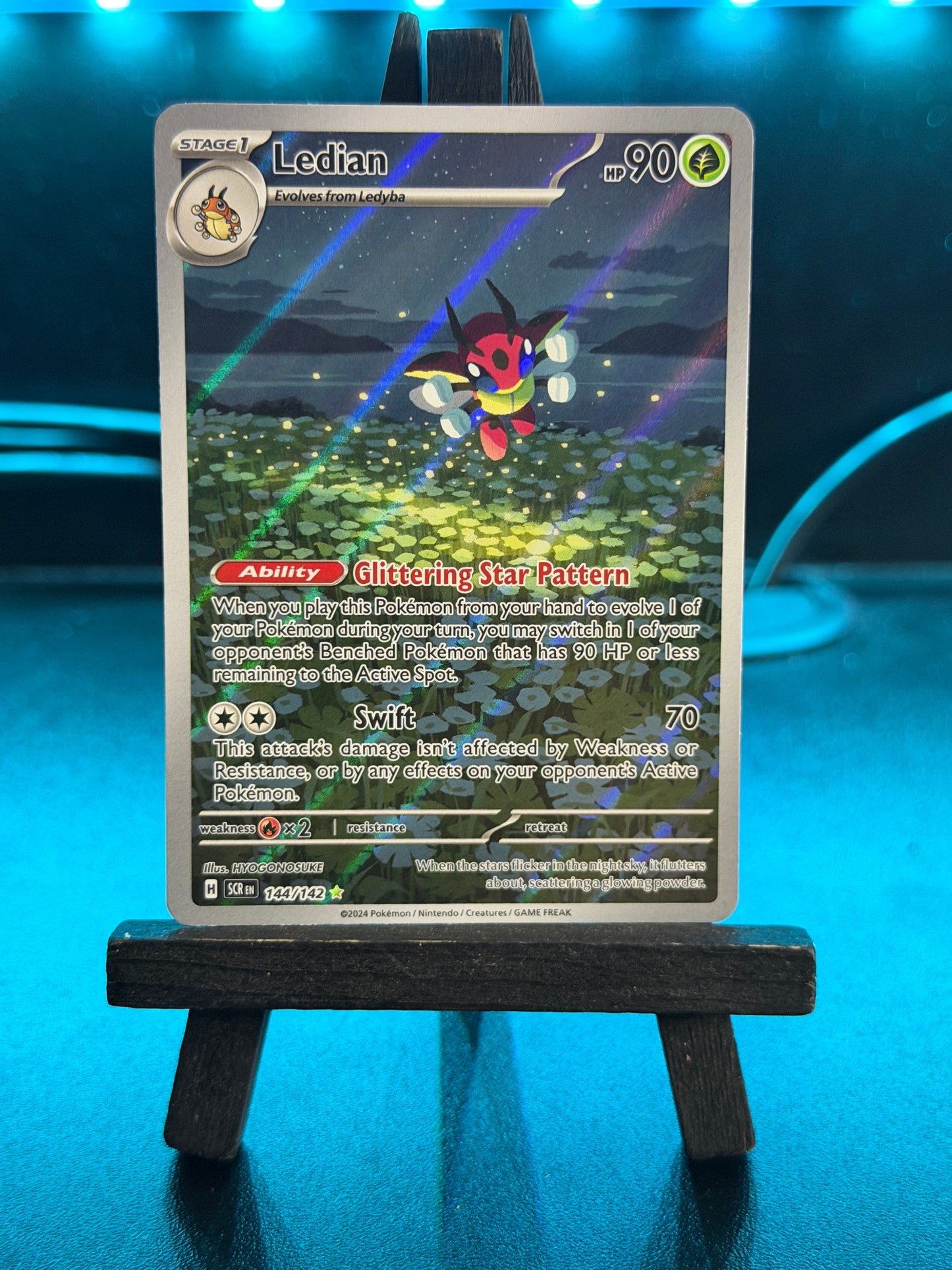 Ledian 144/142 IR Stellar Crown Pokémon Card - English