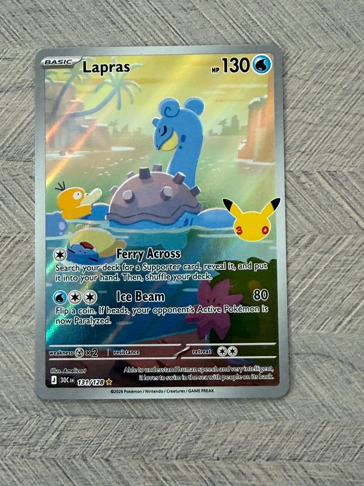 Lapras 131/128 IR 30th Celebration Pokémon Card - English