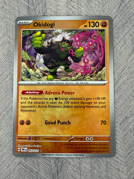 Okidogi 057/131 Masterball Prismatic Evolutions Pokémon Card - English