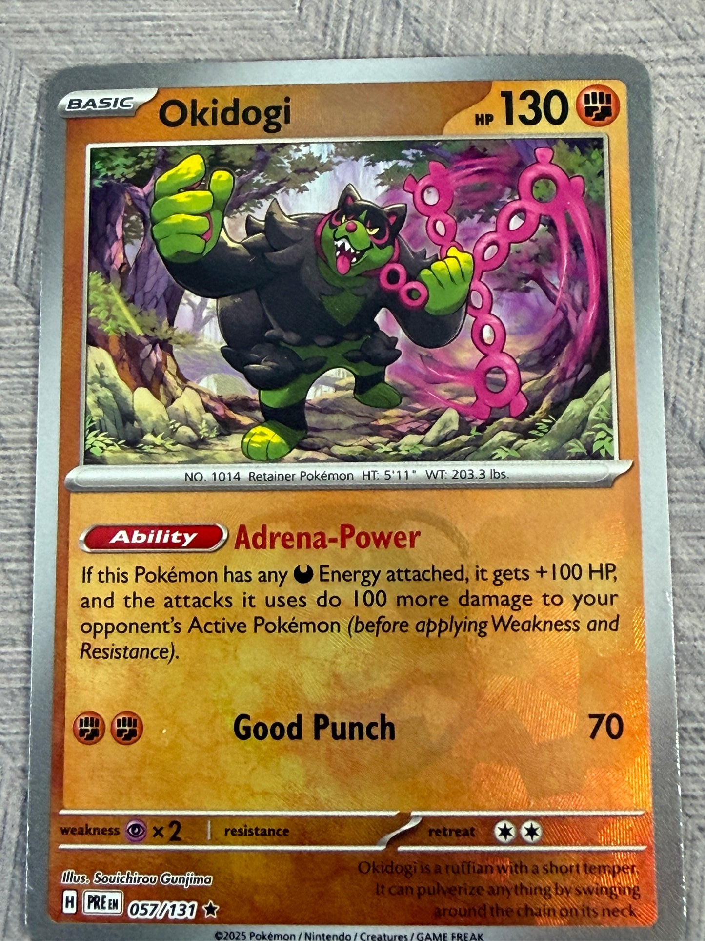 Okidogi 057/131 Masterball Prismatic Evolutions Pokémon Card - English